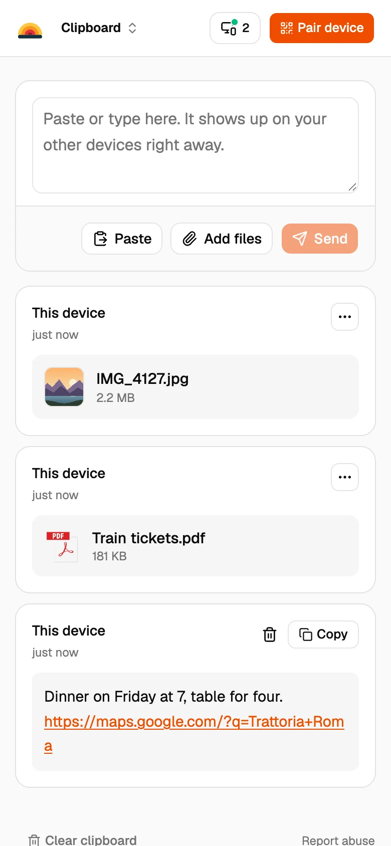 A photo and a PDF added on the phone, ready to view or download on the computer